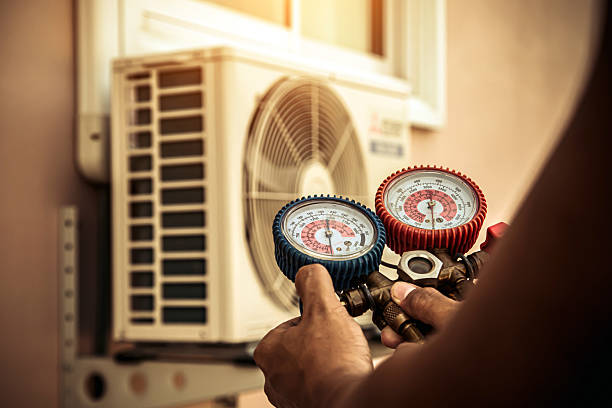 Professional Air Conditioning Service technician working in Bedford, KY